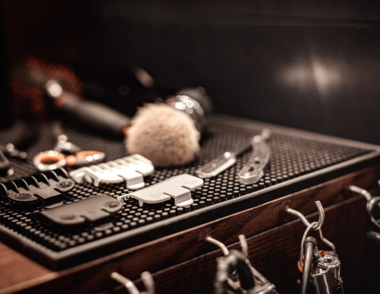 Shaving accessories and tools of barber shop on wooden background